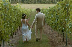 The bride and groom escape from all the fuss for a quiet moment among the grapevines. Amy says the best part of her wedding wasn't in the details, but when she walked down the aisle and saw the loving, proud smiles of her friends and family.